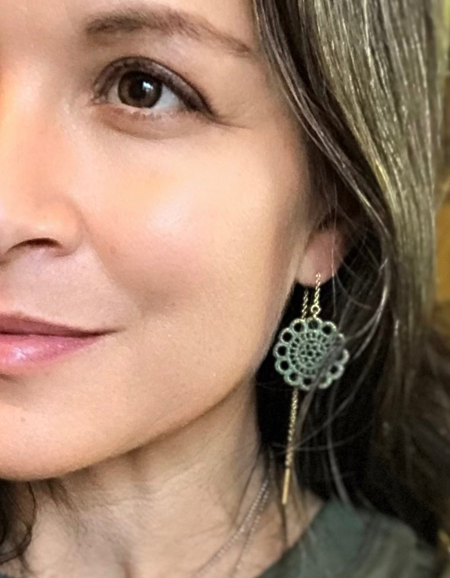 woman wearing boho bronze floral earring threader