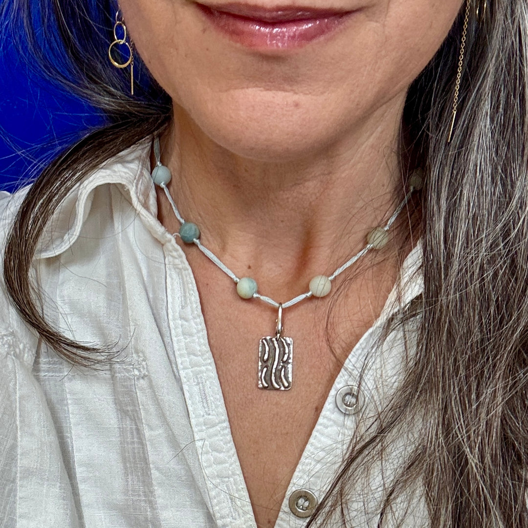 TAO Element Water Adornment tag