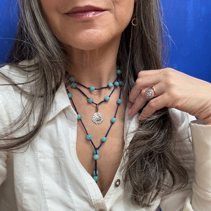 Om in the Lotus Flower tag