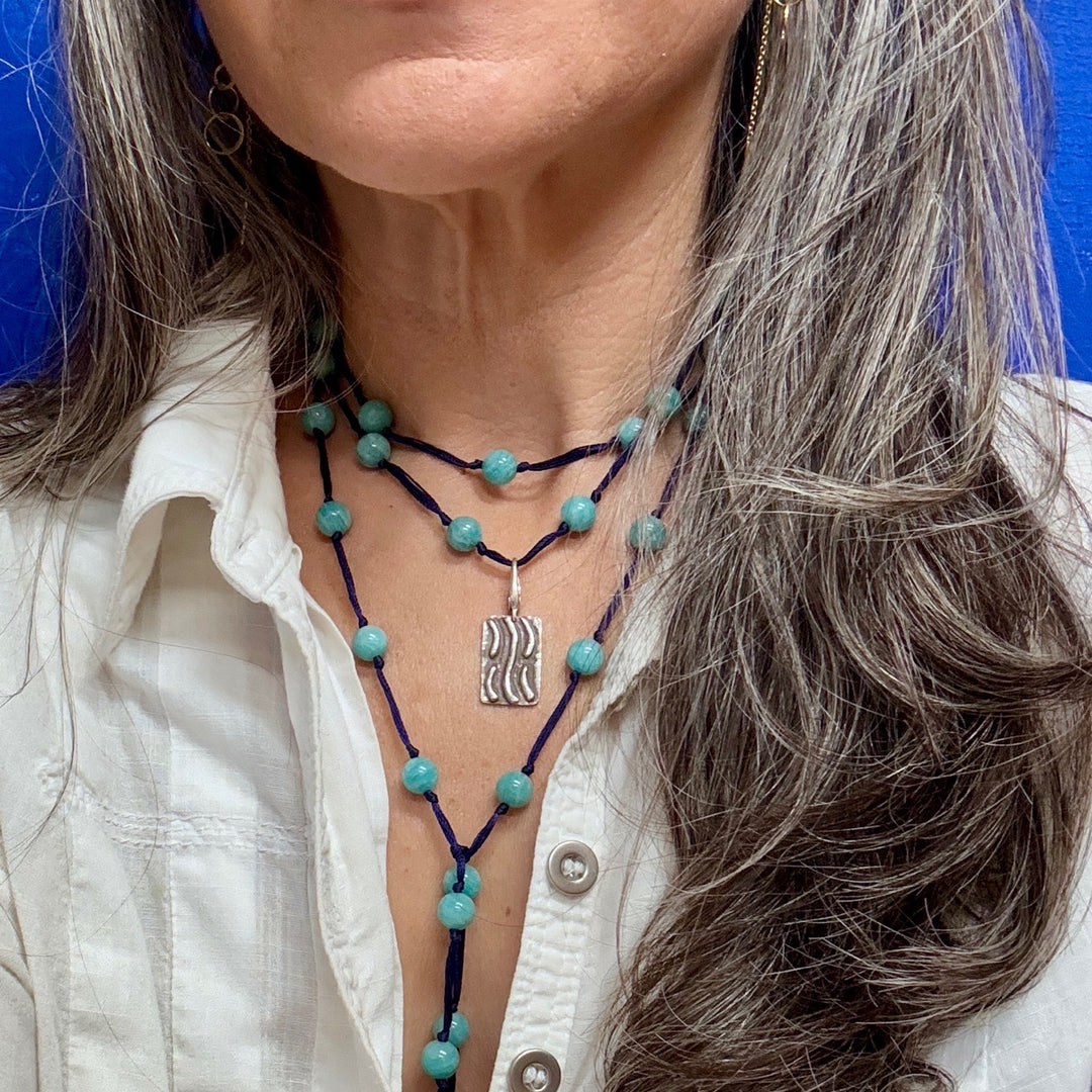 TAO Element Water Adornment tag