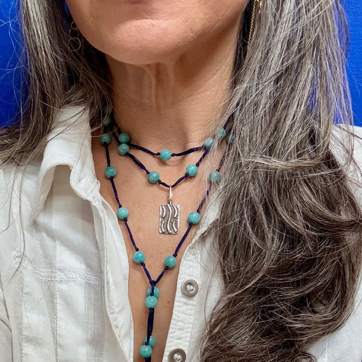 TAO Element Water Adornment tag