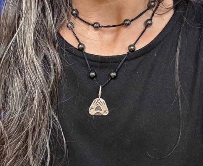 Ocean hands on hematite backbeads