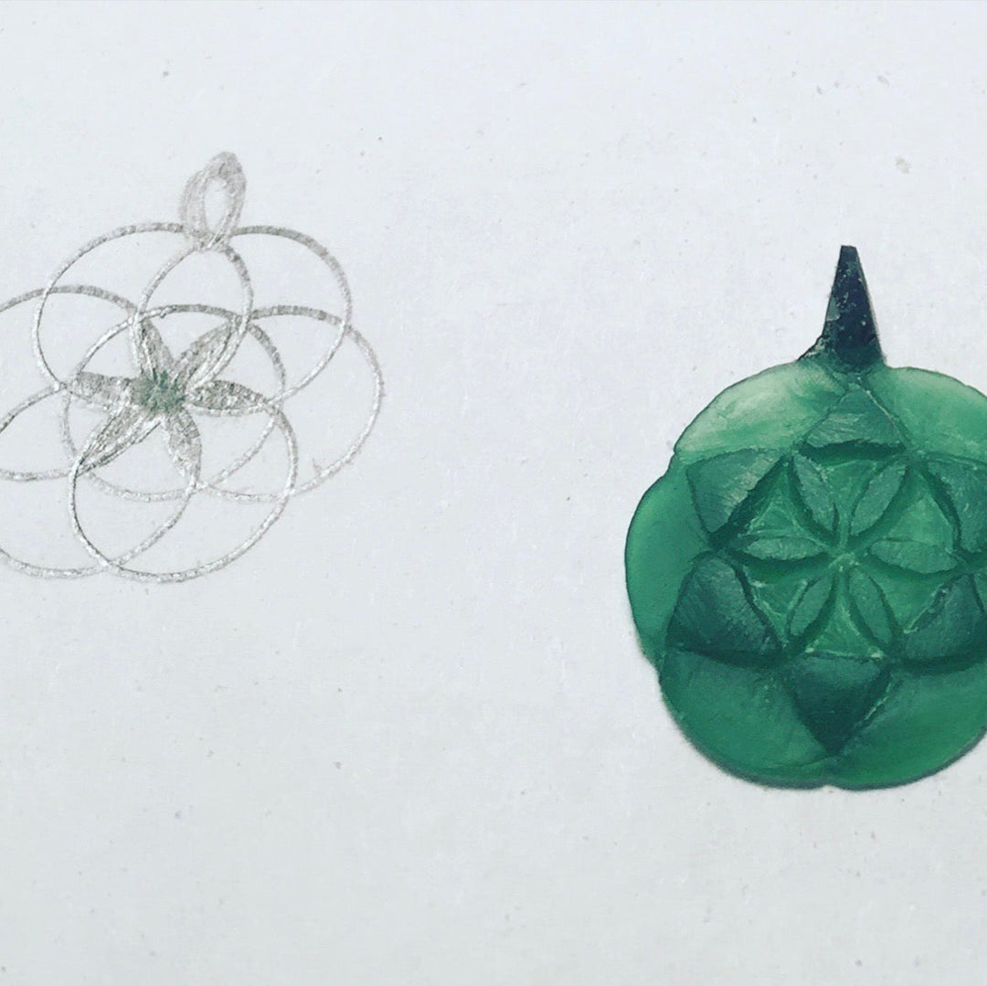 design book sketch of seed of life and original wax carving