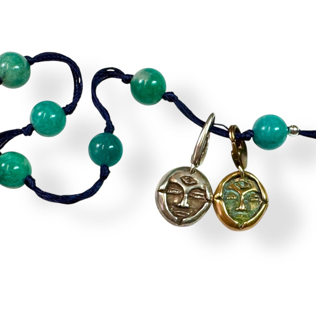 amazonite with silver and bronze emerge charms on white background