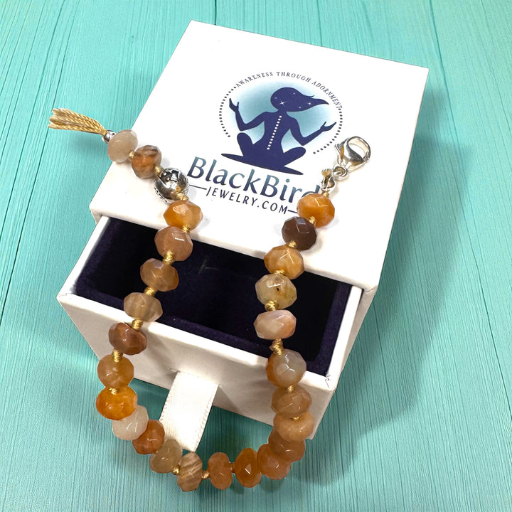 sunstone knotted gemstone bracelet on gift box