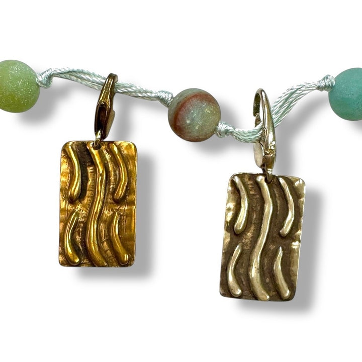 TAO Element Water Adornment tag