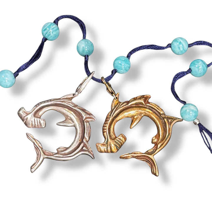 two hammerhead charms on amazonite backbeads