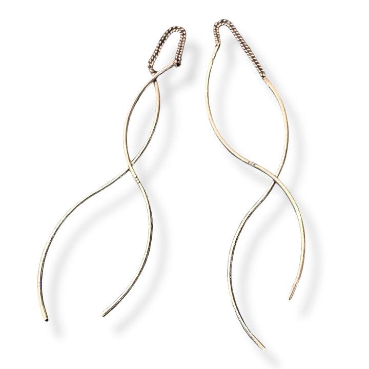 silver threader earrings on white background