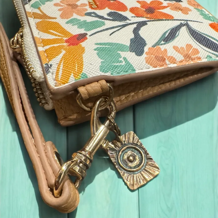 tao fire symbol charm in ancient bronze metal clipped to purse wallet