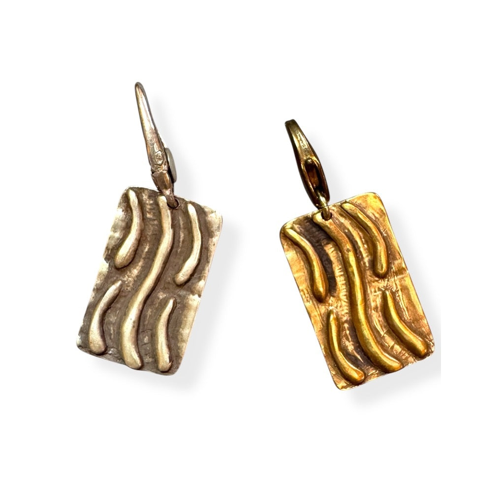 silver and bronze tao water charm