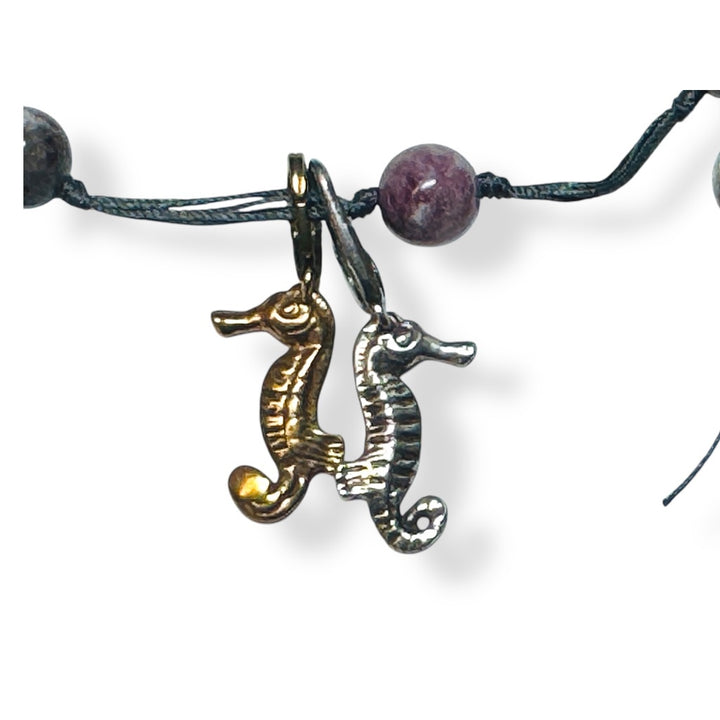 silver and bronze sea horse charms on pink tourmaline backbeads