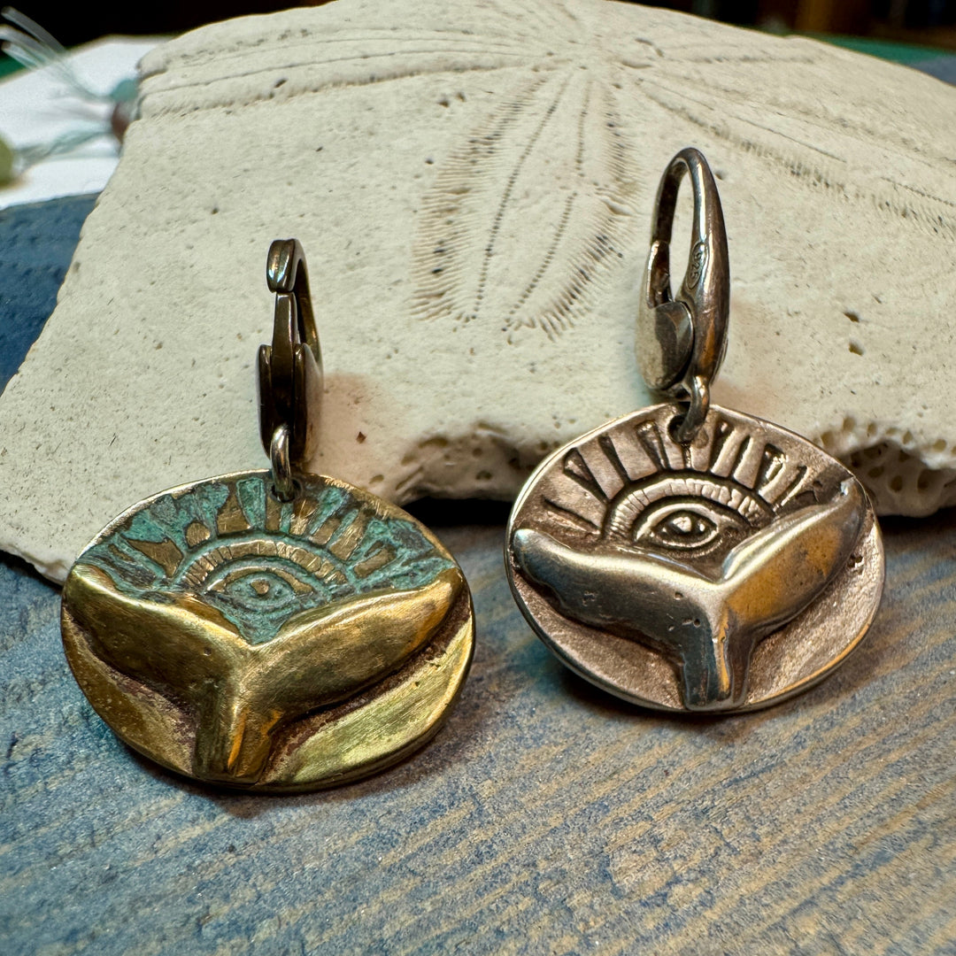 whale tail charms on sand dollar
