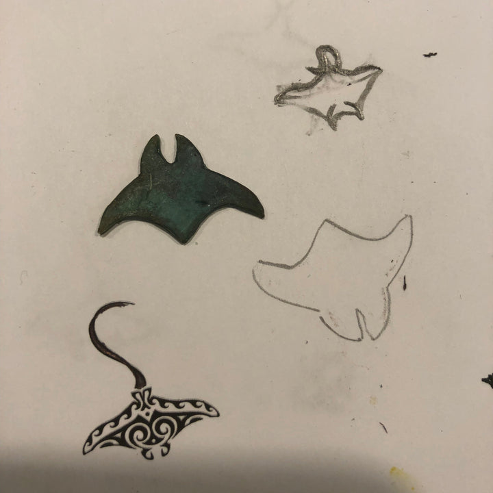 rays drawn on a sketch book 
