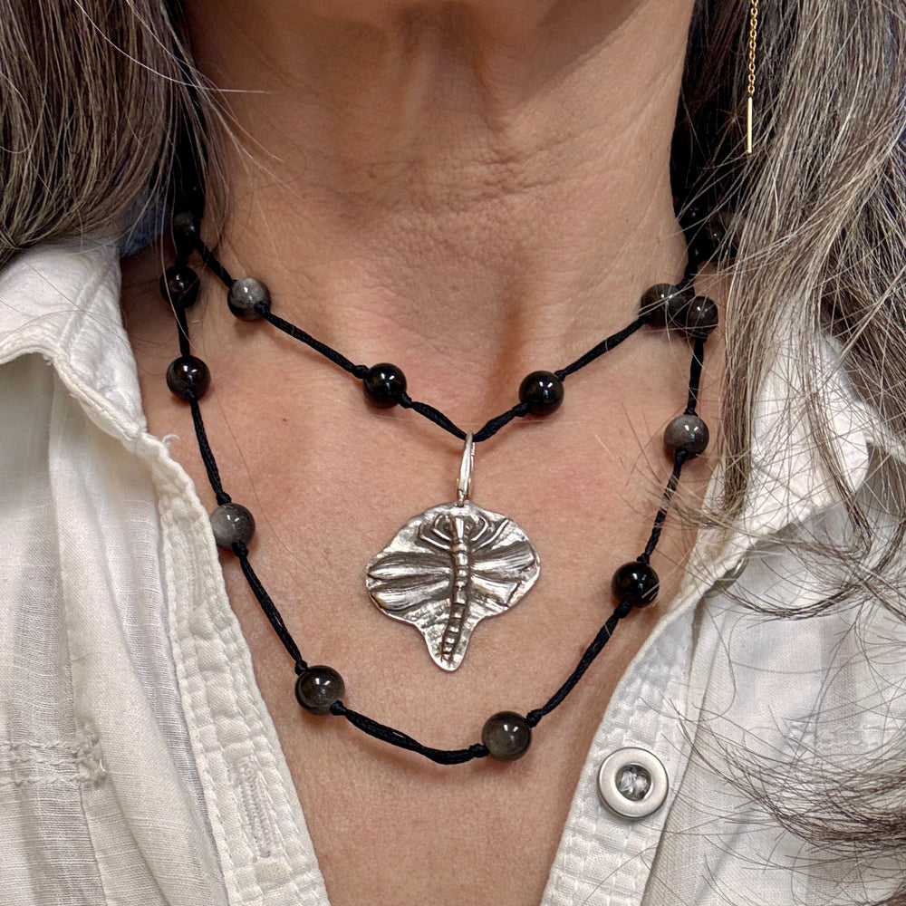 beaded necklace with dragonfly charm

