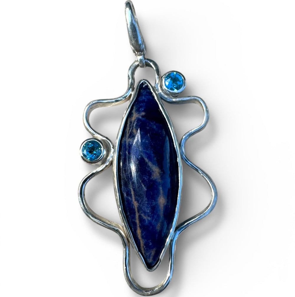 Sodalite pendant with blue topaz stones