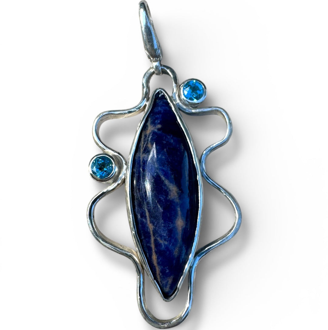 Sodalite pendant with blue topaz stones