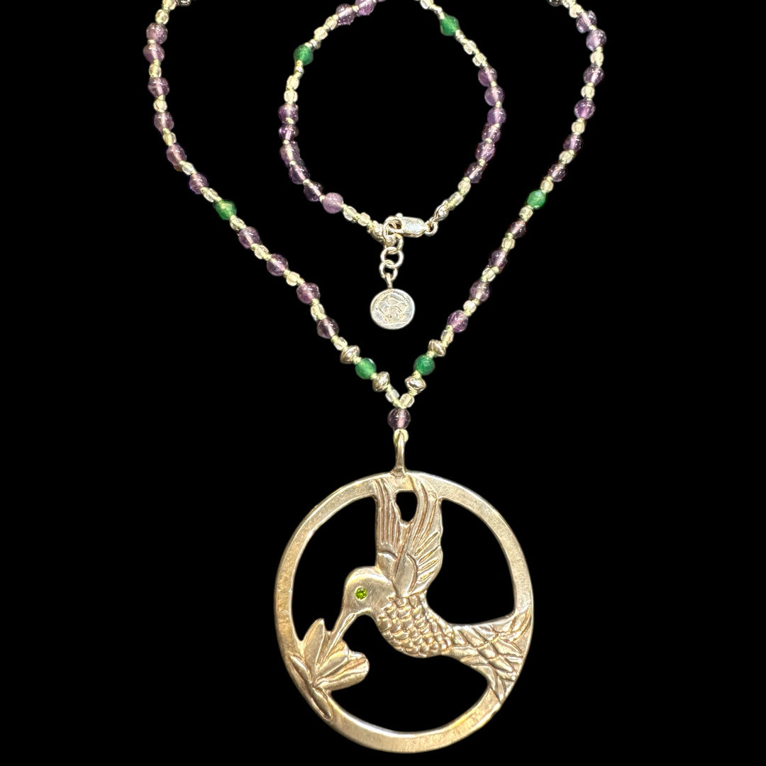 Sterling silver hummingbird necklace with chrome diopside eye